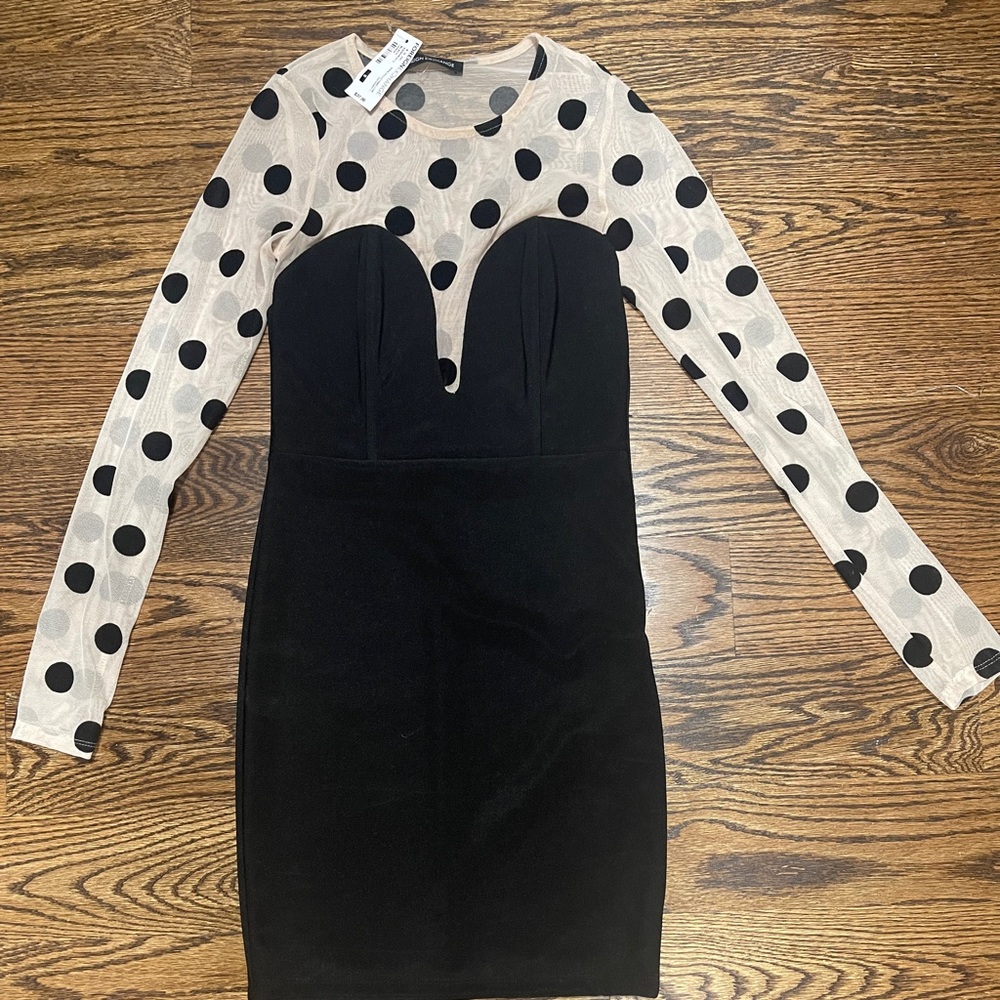 Brand new with tag foreign exchange sheer polka dot and black mini